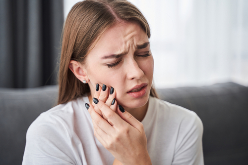woman with tooth pain
