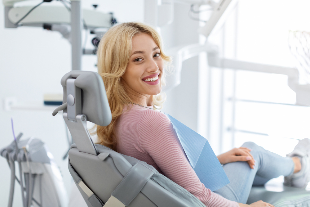 woman smiling in dentist offiice