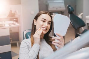 woman smiling in dental chair